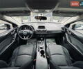 Белый Мазда 3, объемом двигателя 2 л и пробегом 208 тыс. км за 8899 $, фото 34 на Automoto.ua