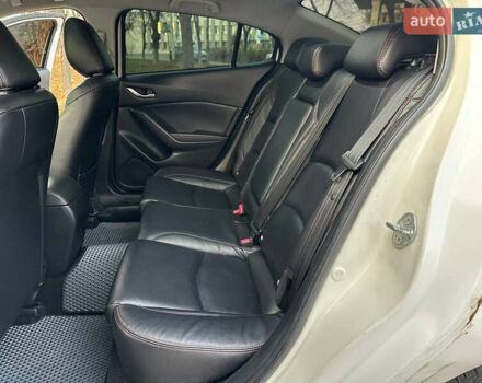 Білий Мазда 3, об'ємом двигуна 2 л та пробігом 276 тис. км за 7999 $, фото 33 на Automoto.ua