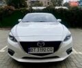 Белый Мазда 3, объемом двигателя 2 л и пробегом 148 тыс. км за 10300 $, фото 1 на Automoto.ua