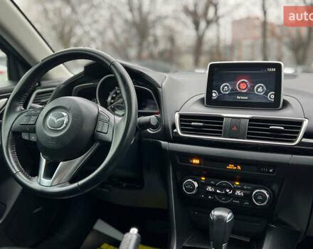 Белый Мазда 3, объемом двигателя 2 л и пробегом 119 тыс. км за 12650 $, фото 18 на Automoto.ua