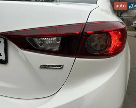 Белый Мазда 3, объемом двигателя 2 л и пробегом 173 тыс. км за 8700 $, фото 13 на Automoto.ua