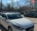 Белый Мазда 3, объемом двигателя 2 л и пробегом 111 тыс. км за 10700 $, фото 1 на Automoto.ua