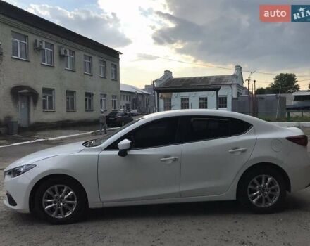 Белый Мазда 3, объемом двигателя 2 л и пробегом 158 тыс. км за 12100 $, фото 4 на Automoto.ua