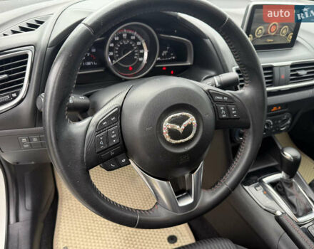Белый Мазда 3, объемом двигателя 2 л и пробегом 114 тыс. км за 10900 $, фото 16 на Automoto.ua