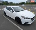Белый Мазда 3, объемом двигателя 2 л и пробегом 151 тыс. км за 10000 $, фото 1 на Automoto.ua