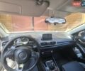 Белый Мазда 3, объемом двигателя 2 л и пробегом 148 тыс. км за 9400 $, фото 1 на Automoto.ua
