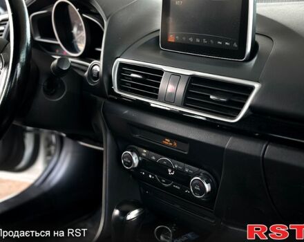 Белый Мазда 3, объемом двигателя 2 л и пробегом 102 тыс. км за 9200 $, фото 8 на Automoto.ua