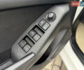 Белый Мазда 3, объемом двигателя 2 л и пробегом 114 тыс. км за 10900 $, фото 17 на Automoto.ua