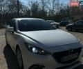 Белый Мазда 3, объемом двигателя 2 л и пробегом 111 тыс. км за 10700 $, фото 2 на Automoto.ua