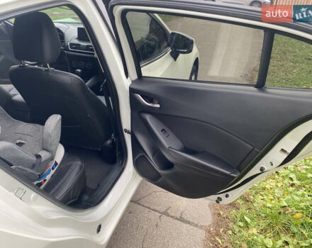 Білий Мазда 3, об'ємом двигуна 2 л та пробігом 175 тис. км за 9000 $, фото 14 на Automoto.ua