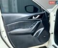 Белый Мазда 3, объемом двигателя 2 л и пробегом 160 тыс. км за 10999 $, фото 10 на Automoto.ua