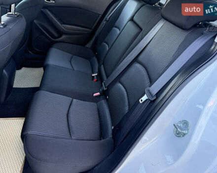 Белый Мазда 3, объемом двигателя 2 л и пробегом 114 тыс. км за 10900 $, фото 19 на Automoto.ua