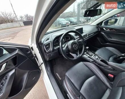 Білий Мазда 3, об'ємом двигуна 2 л та пробігом 147 тис. км за 11500 $, фото 14 на Automoto.ua