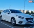 Білий Мазда 3, об'ємом двигуна 1.5 л та пробігом 57 тис. км за 12900 $, фото 1 на Automoto.ua