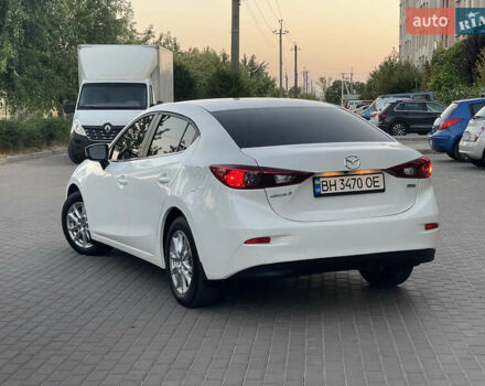 Белый Мазда 3, объемом двигателя 2 л и пробегом 200 тыс. км за 10500 $, фото 3 на Automoto.ua