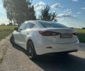 Белый Мазда 3, объемом двигателя 2 л и пробегом 237 тыс. км за 9100 $, фото 4 на Automoto.ua