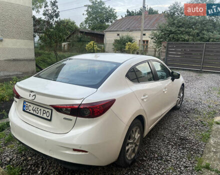 Білий Мазда 3, об'ємом двигуна 2 л та пробігом 149 тис. км за 10400 $, фото 2 на Automoto.ua