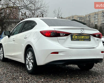 Белый Мазда 3, объемом двигателя 2 л и пробегом 119 тыс. км за 12650 $, фото 3 на Automoto.ua