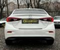 Белый Мазда 3, объемом двигателя 2 л и пробегом 119 тыс. км за 12650 $, фото 4 на Automoto.ua