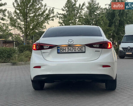Белый Мазда 3, объемом двигателя 2 л и пробегом 200 тыс. км за 10500 $, фото 9 на Automoto.ua