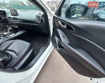 Білий Мазда 3, об'ємом двигуна 2 л та пробігом 147 тис. км за 11500 $, фото 17 на Automoto.ua