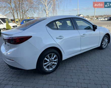 Белый Мазда 3, объемом двигателя 2 л и пробегом 114 тыс. км за 10900 $, фото 5 на Automoto.ua