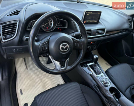 Белый Мазда 3, объемом двигателя 2 л и пробегом 114 тыс. км за 10900 $, фото 14 на Automoto.ua