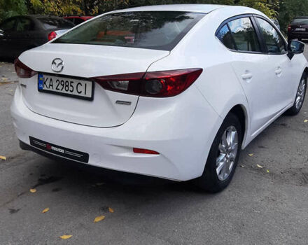 Белый Мазда 3, объемом двигателя 2 л и пробегом 211 тыс. км за 9300 $, фото 3 на Automoto.ua