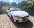 Белый Мазда 3, объемом двигателя 2 л и пробегом 148 тыс. км за 9400 $, фото 1 на Automoto.ua