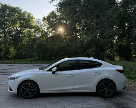 Белый Мазда 3, объемом двигателя 2 л и пробегом 129 тыс. км за 11000 $, фото 1 на Automoto.ua