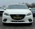 Белый Мазда 3, объемом двигателя 2 л и пробегом 119 тыс. км за 12650 $, фото 1 на Automoto.ua