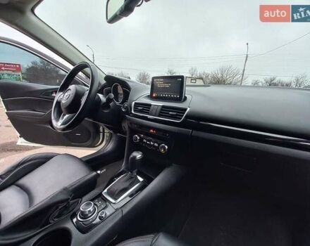 Білий Мазда 3, об'ємом двигуна 2 л та пробігом 147 тис. км за 11500 $, фото 16 на Automoto.ua