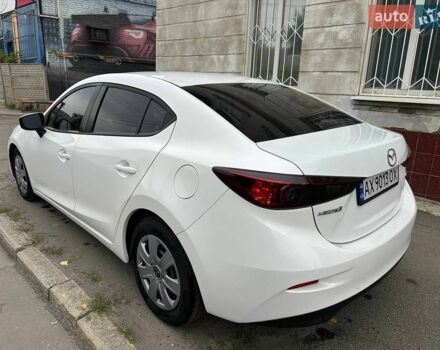 Белый Мазда 3, объемом двигателя 2 л и пробегом 111 тыс. км за 12500 $, фото 1 на Automoto.ua