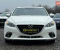 Белый Мазда 3, объемом двигателя 2 л и пробегом 119 тыс. км за 12650 $, фото 1 на Automoto.ua