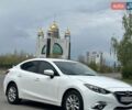 Белый Мазда 3, объемом двигателя 2 л и пробегом 180 тыс. км за 10800 $, фото 1 на Automoto.ua