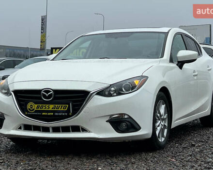 Белый Мазда 3, объемом двигателя 2 л и пробегом 119 тыс. км за 12650 $, фото 2 на Automoto.ua