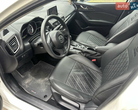 Белый Мазда 3, объемом двигателя 2 л и пробегом 173 тыс. км за 8700 $, фото 21 на Automoto.ua