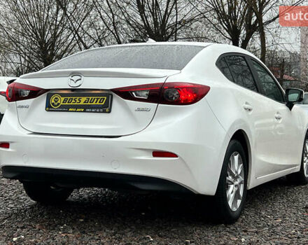 Белый Мазда 3, объемом двигателя 2 л и пробегом 119 тыс. км за 12650 $, фото 5 на Automoto.ua