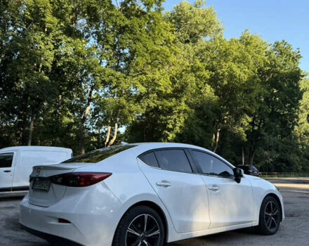 Белый Мазда 3, объемом двигателя 2 л и пробегом 129 тыс. км за 11000 $, фото 8 на Automoto.ua