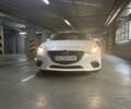 Белый Мазда 3, объемом двигателя 2 л и пробегом 144 тыс. км за 10500 $, фото 1 на Automoto.ua