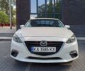 Белый Мазда 3, объемом двигателя 2 л и пробегом 174 тыс. км за 9600 $, фото 1 на Automoto.ua