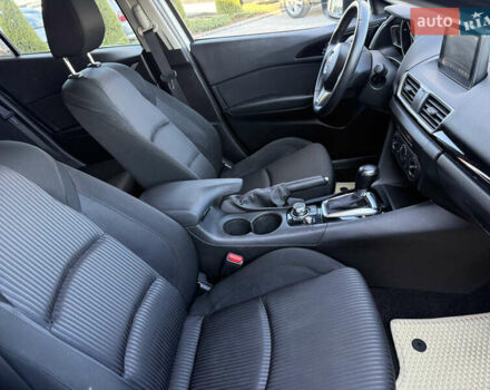 Белый Мазда 3, объемом двигателя 2 л и пробегом 114 тыс. км за 10900 $, фото 18 на Automoto.ua