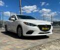 Белый Мазда 3, объемом двигателя 2 л и пробегом 190 тыс. км за 11000 $, фото 1 на Automoto.ua