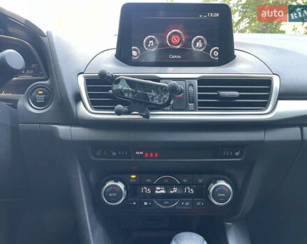 Білий Мазда 3, об'ємом двигуна 1.6 л та пробігом 116 тис. км за 13000 $, фото 11 на Automoto.ua