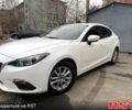 Белый Мазда 3, объемом двигателя 2 л и пробегом 140 тыс. км за 11800 $, фото 1 на Automoto.ua