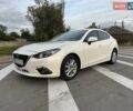 Белый Мазда 3, объемом двигателя 2 л и пробегом 178 тыс. км за 12900 $, фото 2 на Automoto.ua