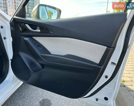 Білий Мазда 3, об'ємом двигуна 2 л та пробігом 156 тис. км за 10799 $, фото 20 на Automoto.ua