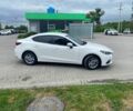 Белый Мазда 3, объемом двигателя 2 л и пробегом 196 тыс. км за 11000 $, фото 1 на Automoto.ua
