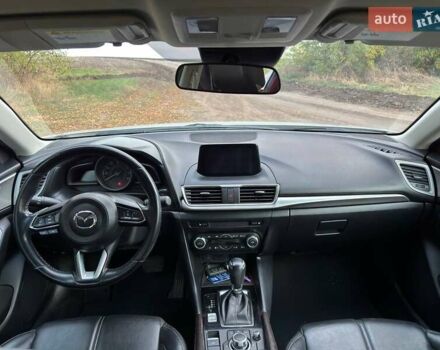 Белый Мазда 3, объемом двигателя 2 л и пробегом 143 тыс. км за 12900 $, фото 8 на Automoto.ua