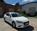 Белый Мазда 3, объемом двигателя 2 л и пробегом 130 тыс. км за 10500 $, фото 1 на Automoto.ua